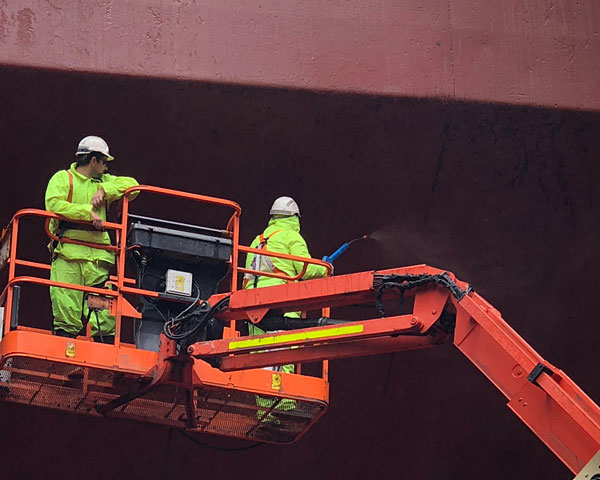 cargo ship hull cleaning rapid response - three ocean maritime